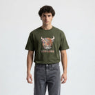 Scotland Unisex Rainbow Highland Cow Graphic T-Shirt – Asparagus Green - Heritage Of Scotland - XS